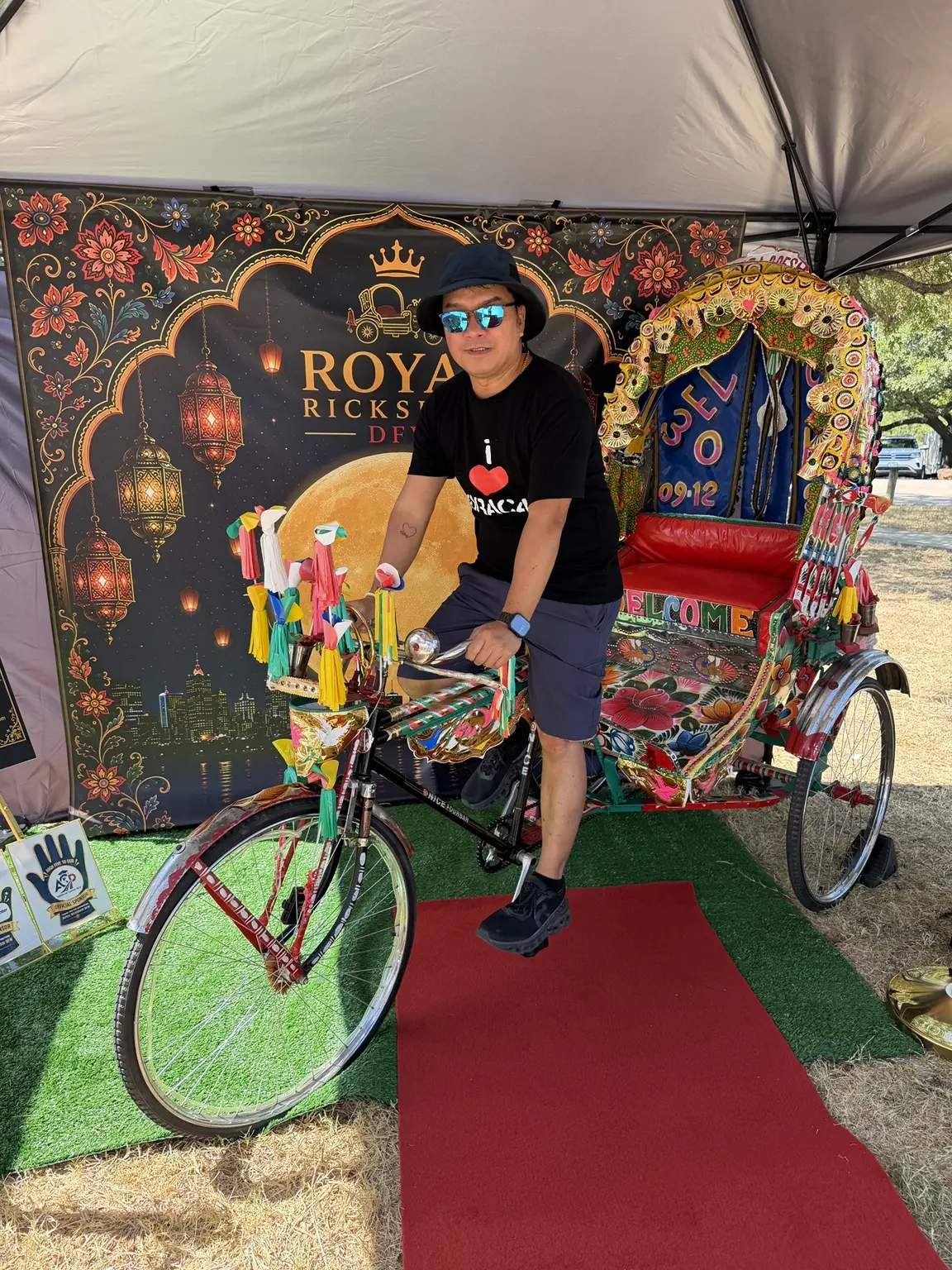 Guest enjoying the authentic Bangladeshi rickshaw at Dallas Moon Festival