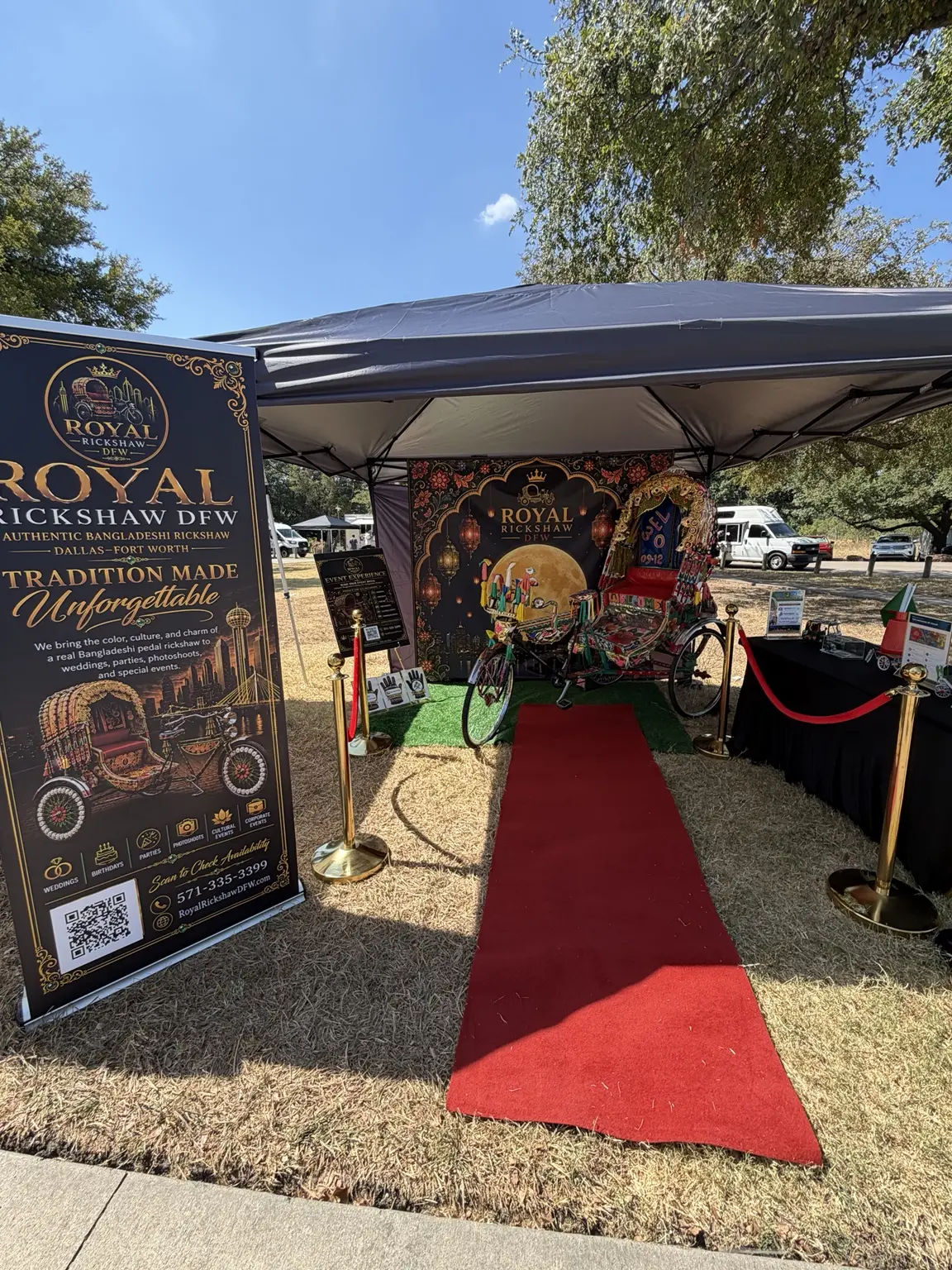 Complete Royal Rickshaw DFW festival booth with cultural displays