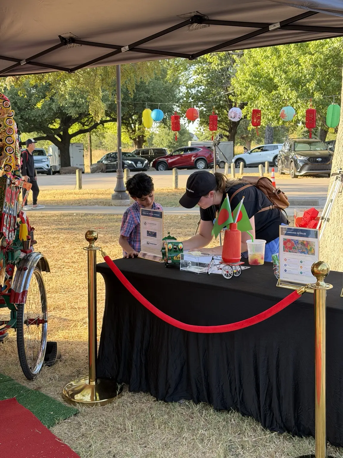 Children participating at the Royal Rickshaw DFW festival activity table