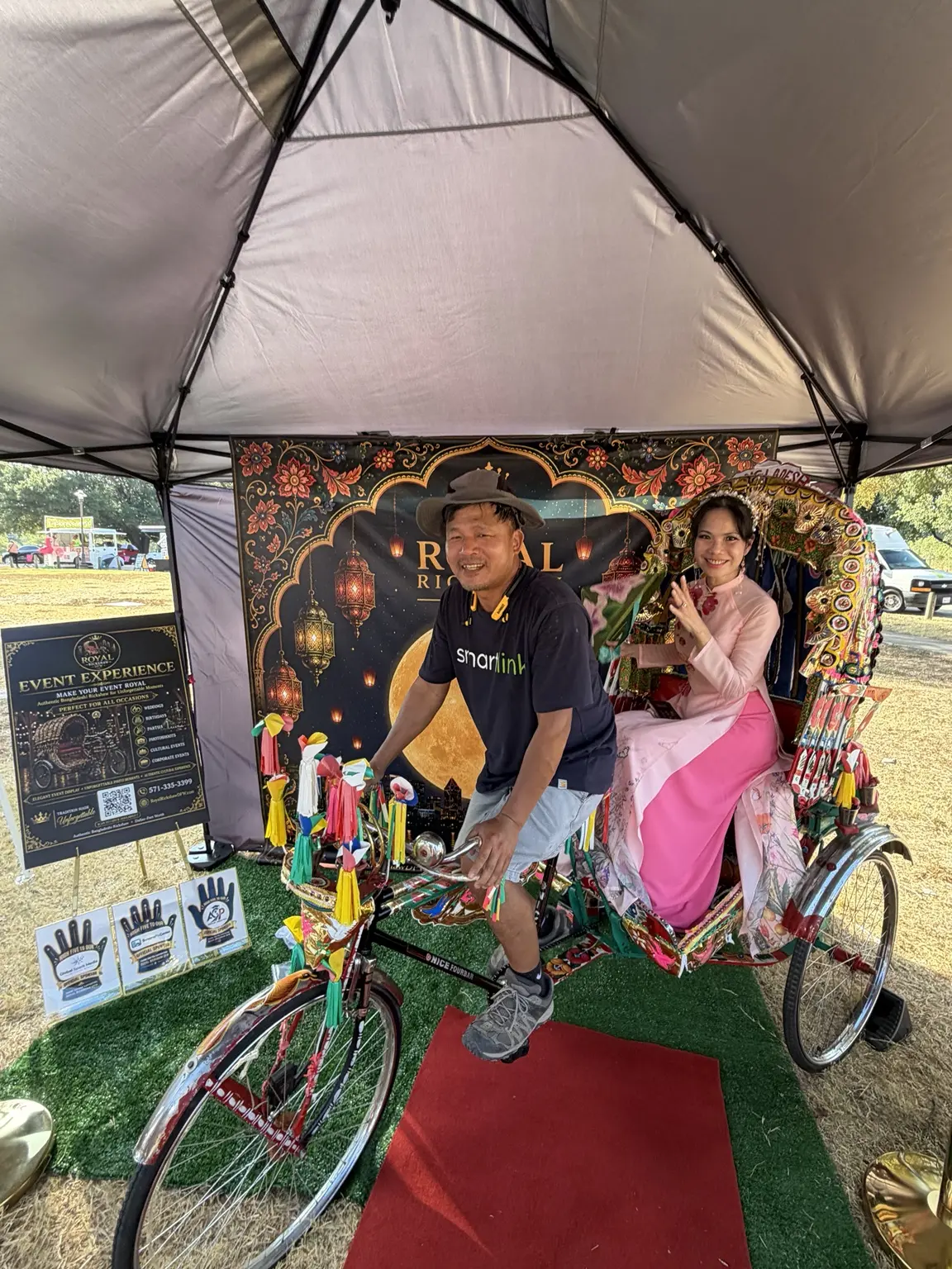 Festival guests sharing a joyful Royal Rickshaw photo experience