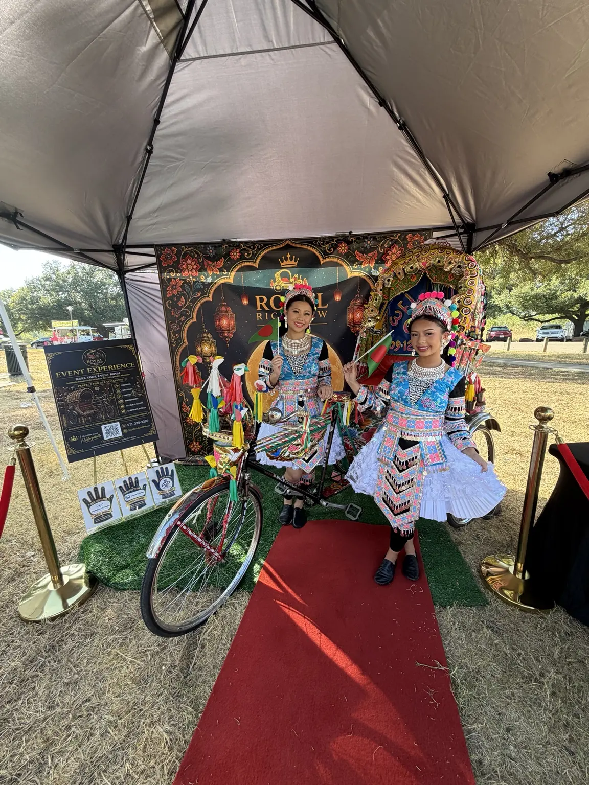 Festival guest enjoying the authentic Royal Rickshaw cultural experience