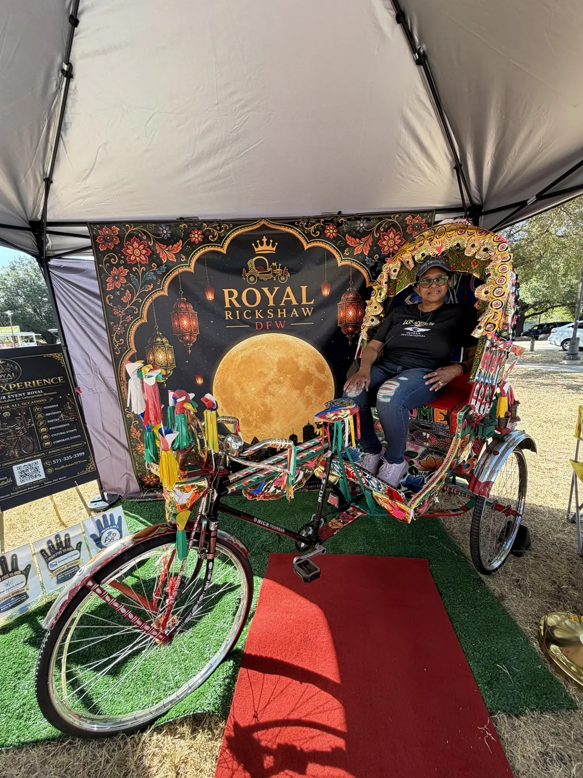 Guest seated inside the authentic Bangladeshi rickshaw at Dallas Moon Festival