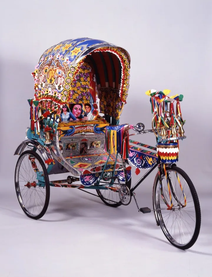 Reference photograph of an elaborately decorated Bangladeshi cycle rickshaw