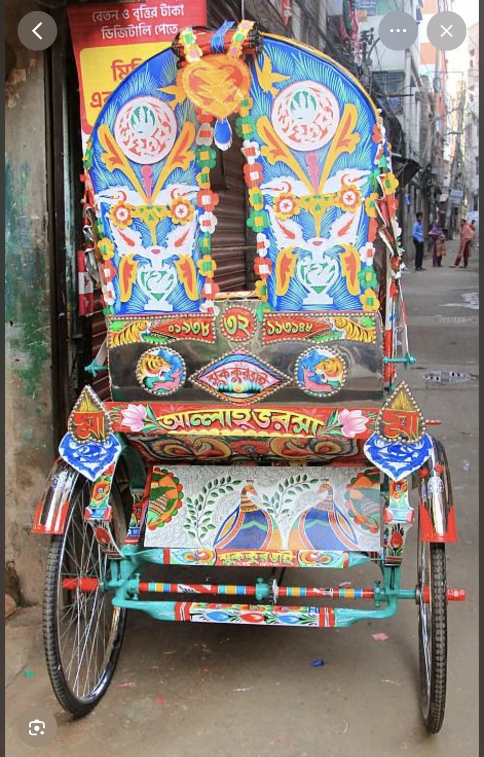 Reference image showing the painted rear of a Bangladeshi rickshaw