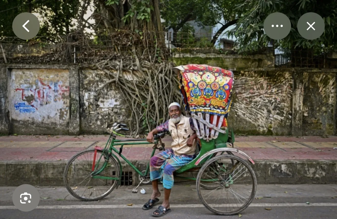 Reference image of a rickshaw driver with his vehicle